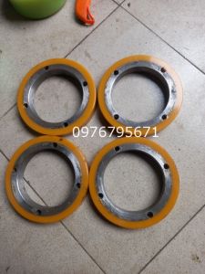 Gia công con lăn thép 210x70 bọc Pu vàng 90shore
