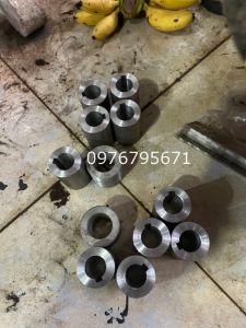 con lăn thép 100x50 bọc cao su đen shore A